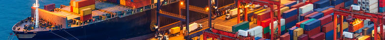 cargo ship and containers in shipyard