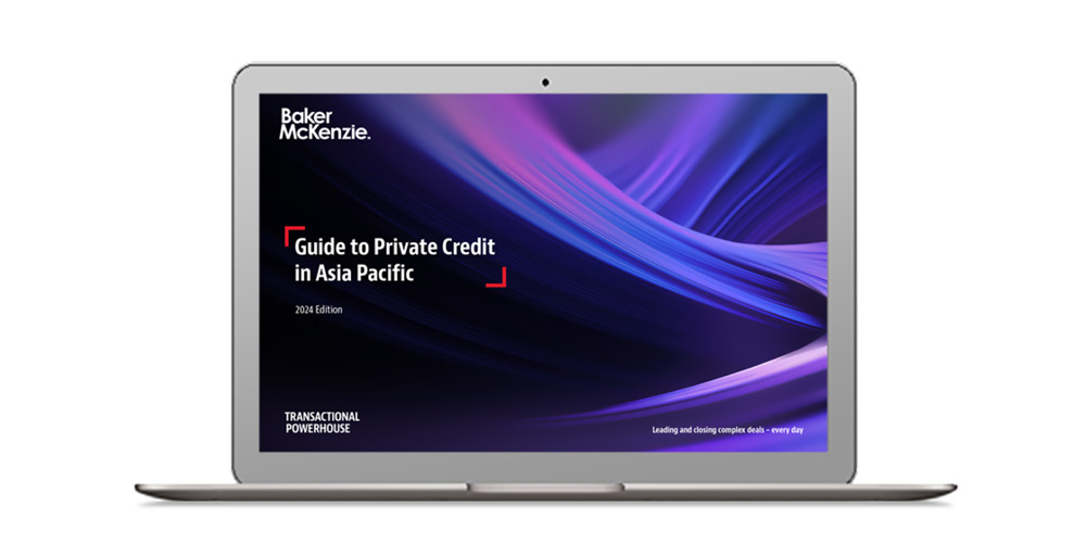 Laptop image with guide cover of Guide to Private Credit in Asia Pacific